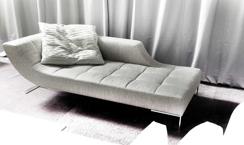 Stylish chaise lounge enhancing modern interiors, perfect for contemporary living room design and comfort.