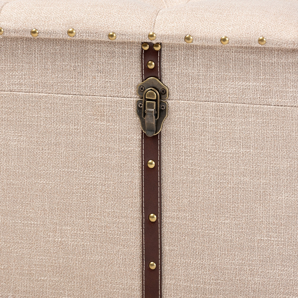 Copy of Kyra beige fabric upholstered storage trunk ottoman.