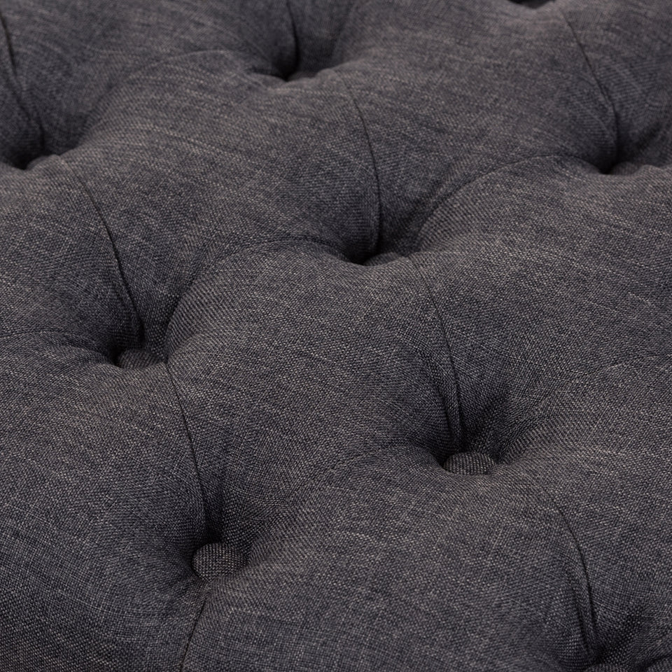 Annabelle modern button-tufted storage ottoman.