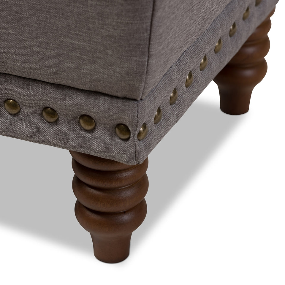 Annabelle modern button-tufted storage ottoman.