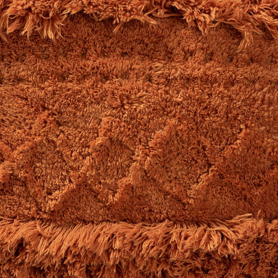 Curlew Moroccan inspired orange handwoven cotton pouf ottoman.