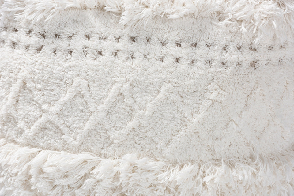 Curlew Moroccan inspired ivory handwoven cotton pouf ottoman.