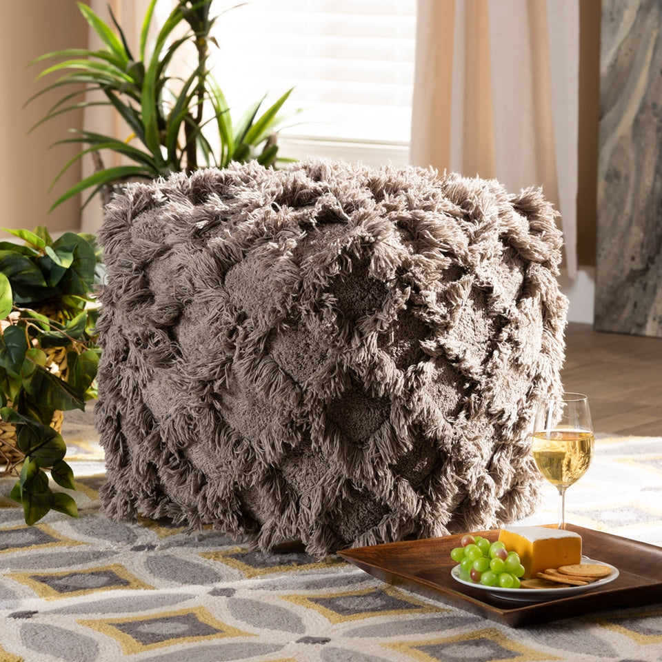 Asuka Moroccan inspired taupe handwoven cotton fringe pouf ottoman.
