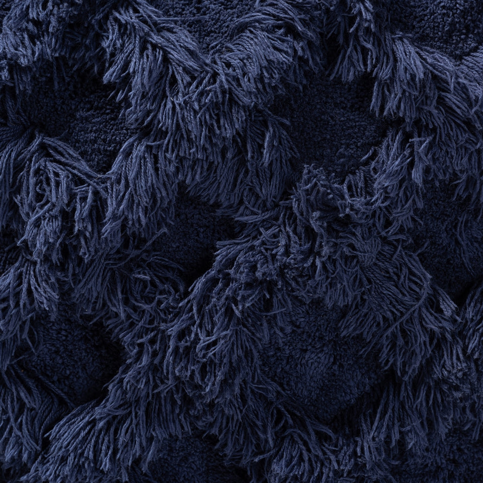 Asuka Moroccan inspired navy handwoven cotton fringe pouf ottoman.