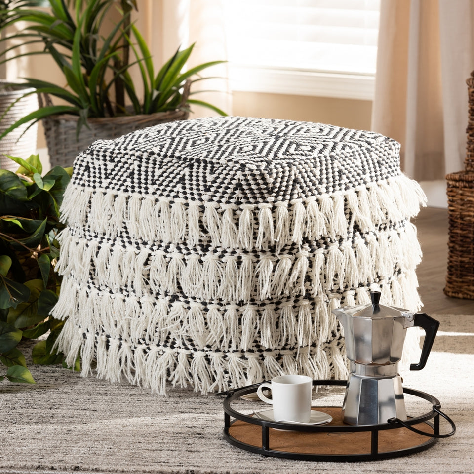 Alain Moroccan inspired black and ivory handwoven wool tassel pouf ottoman.
