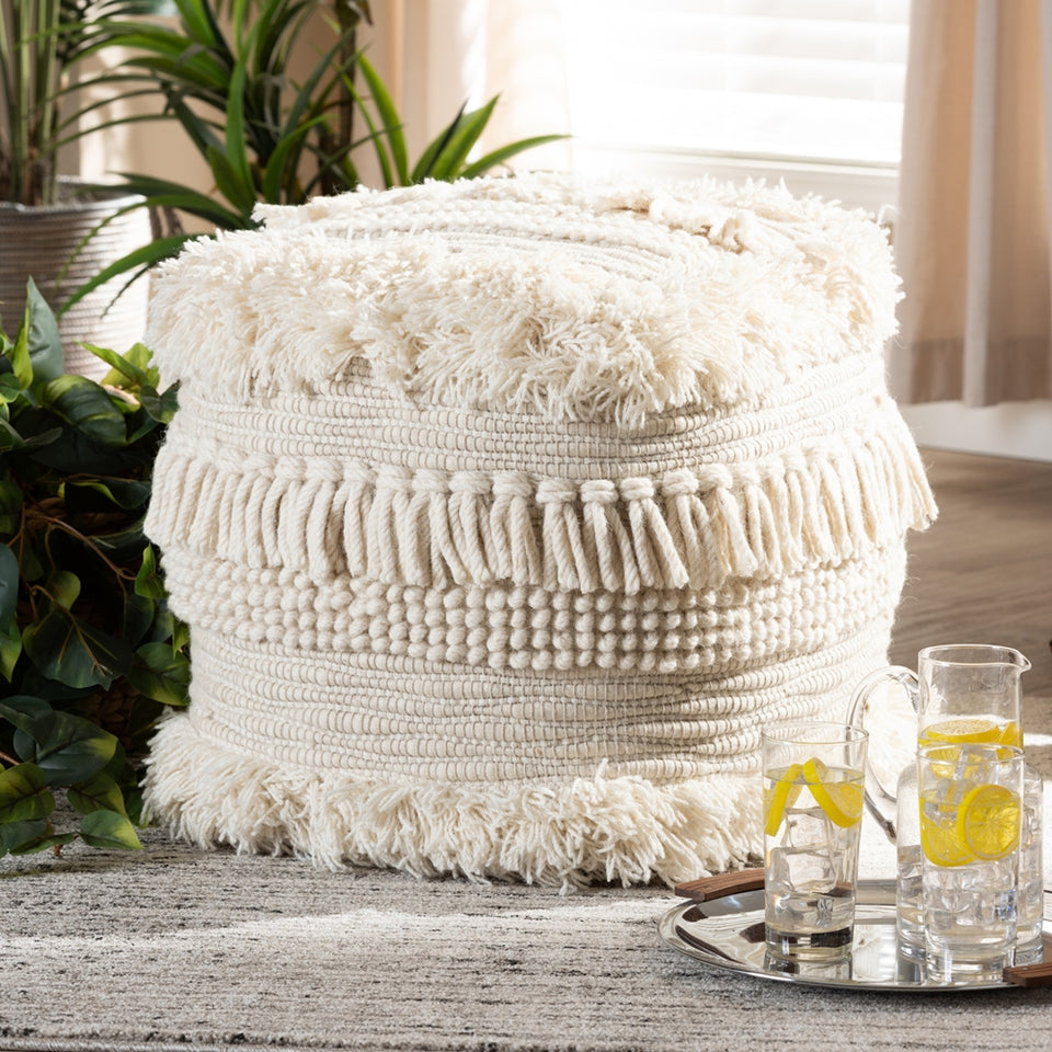 Bartow Moroccan inspired beige handwoven cotton pouf ottoman.