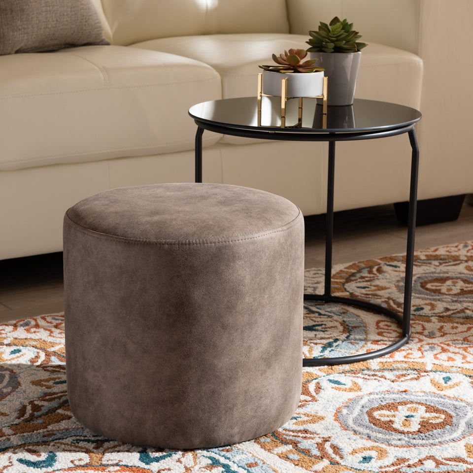 Kira modern 2-piece nesting table and ottoman set.