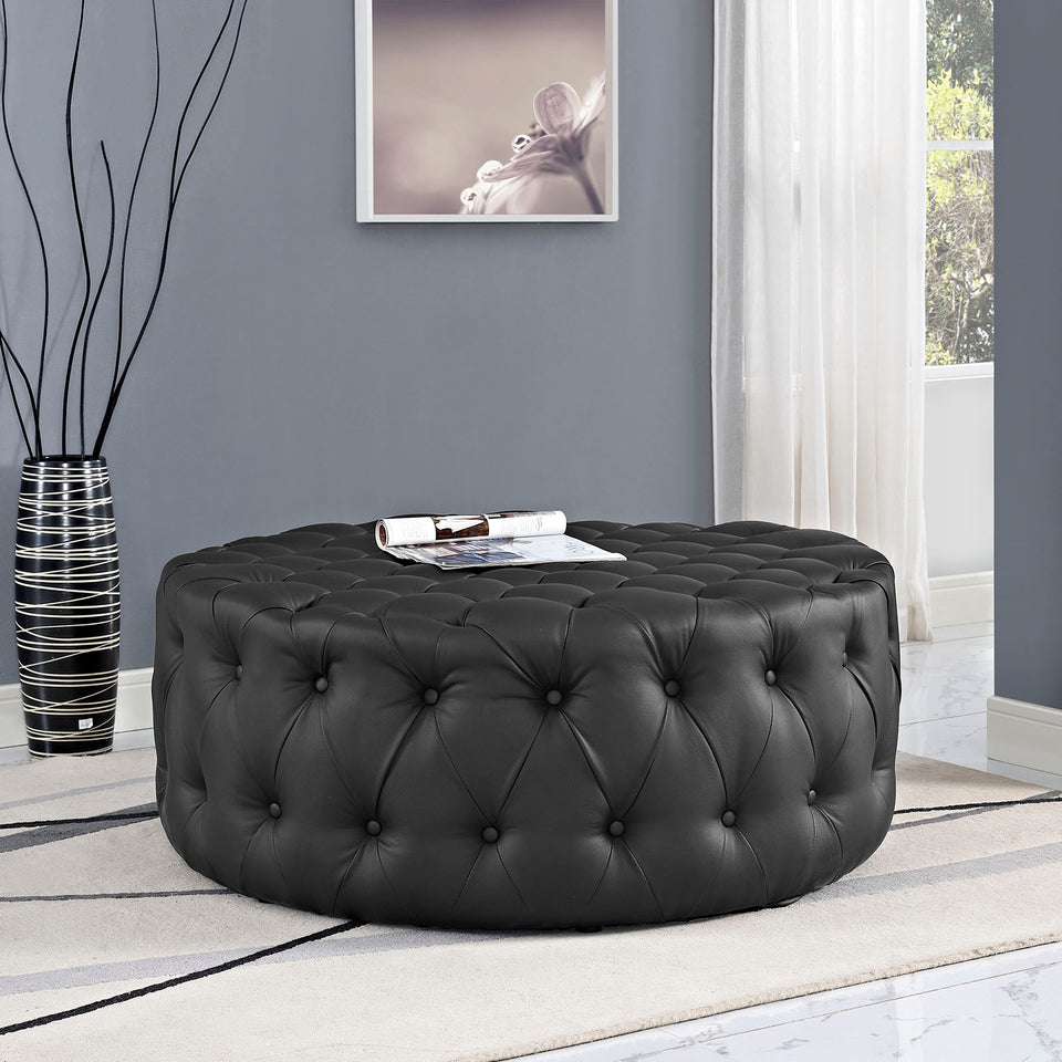 Amour Upholstered Vinyl Ottoman.