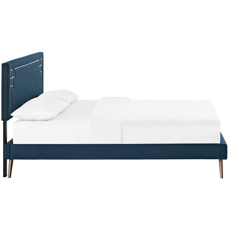 RUTHIE FABRIC PLATFORM BED WITH ROUND SPLAYED LEGS IN AZURE.