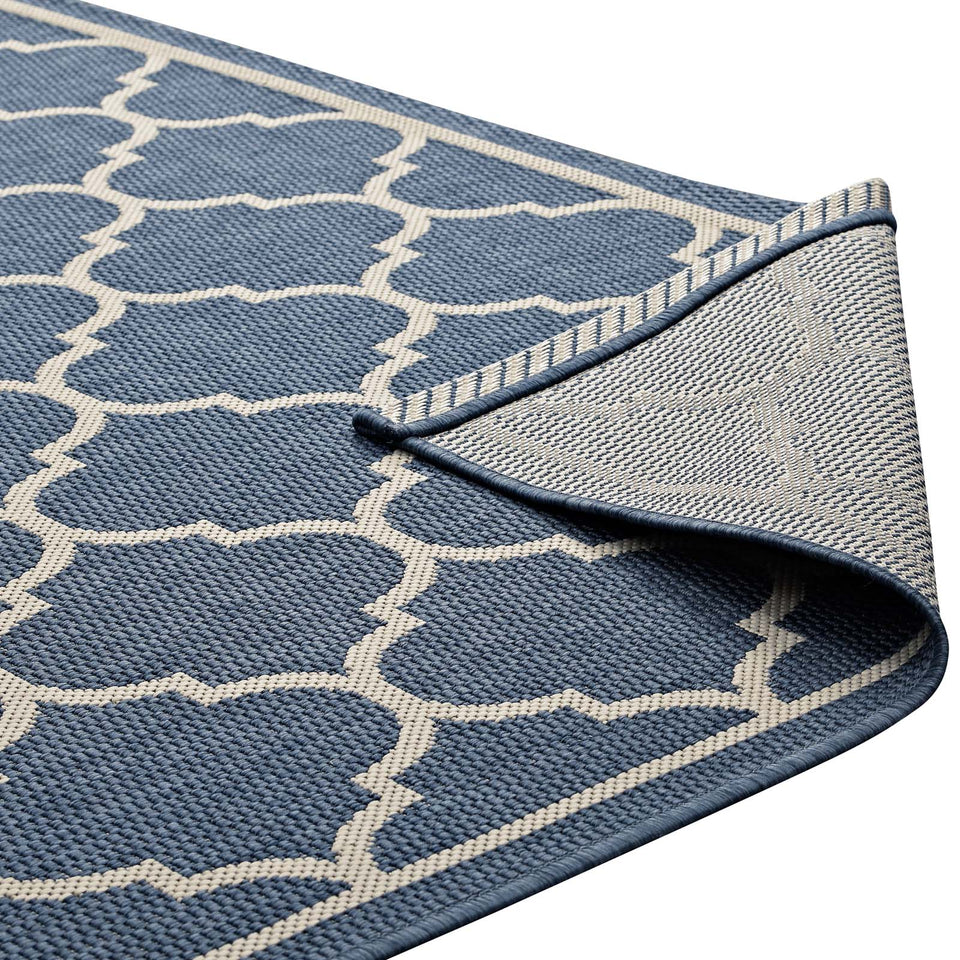 Avena Moroccan Quatrefoil Trellis Indoor and Outdoor Area Rug in Blue and Beige.