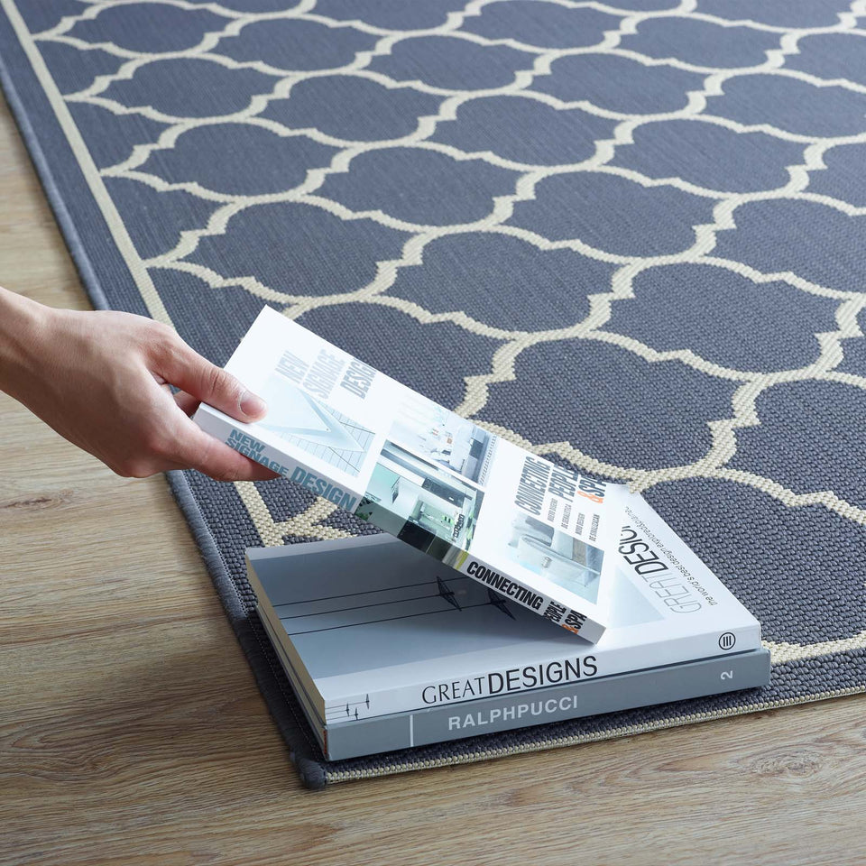 Avena Moroccan Quatrefoil Trellis Indoor and Outdoor Area Rug in Blue and Beige.