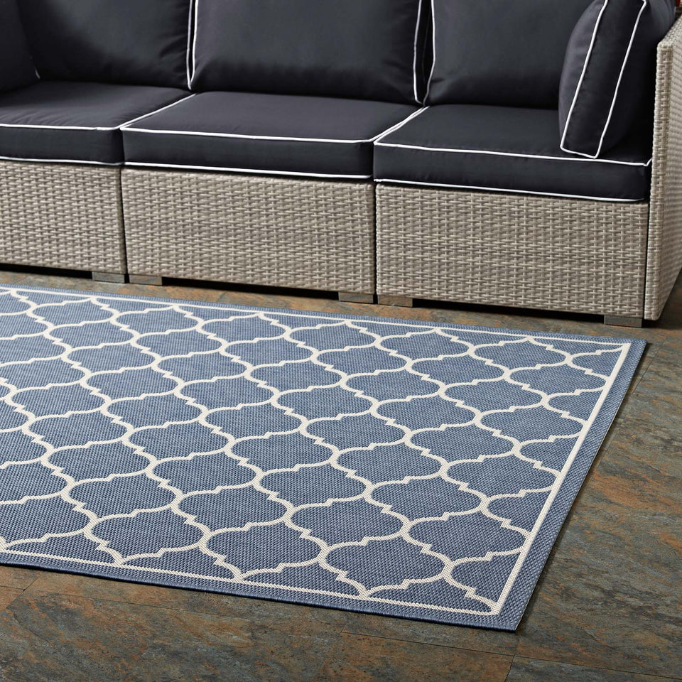 Avena Moroccan Quatrefoil Trellis Indoor and Outdoor Area Rug in Blue and Beige.