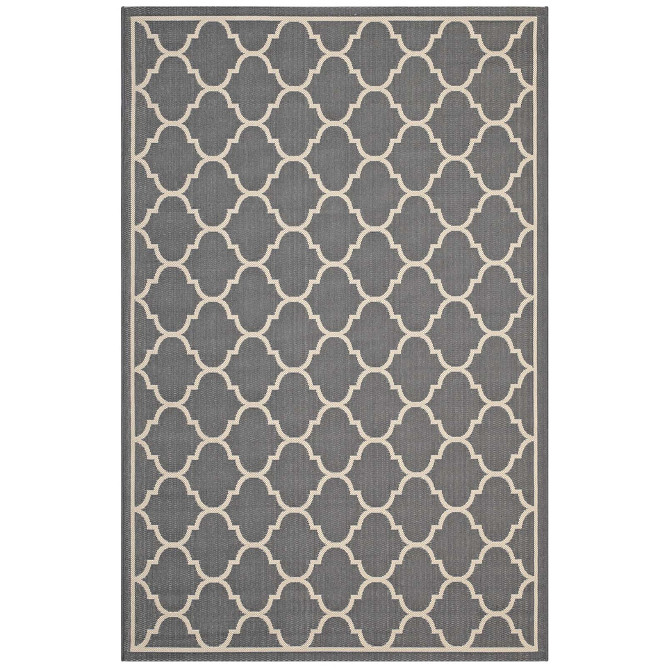 Avena Moroccan Quatrefoil Trellis Indoor and Outdoor Area Rug in Gray and Beige.