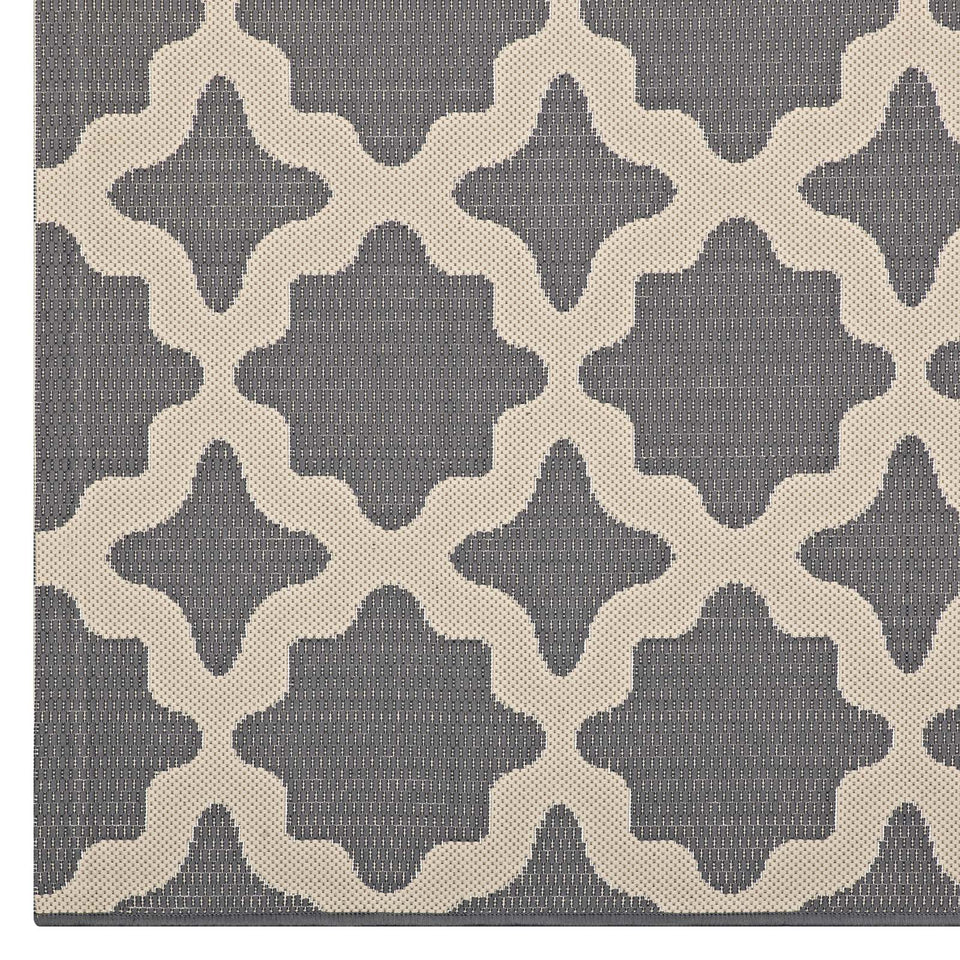 Cerelia Moroccan Trellis Indoor and Outdoor Area Rug in Gray and Beige.