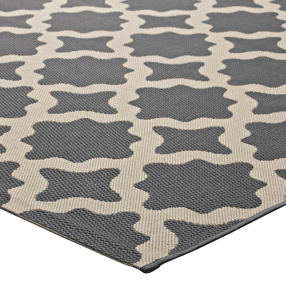 Cerelia Moroccan Trellis Indoor and Outdoor Area Rug in Gray and Beige.