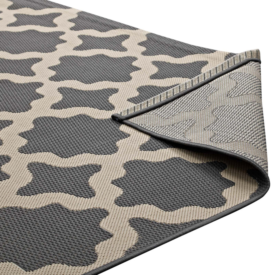 Cerelia Moroccan Trellis Indoor and Outdoor Area Rug in Gray and Beige.