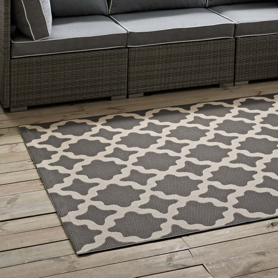 Cerelia Moroccan Trellis Indoor and Outdoor Area Rug in Gray and Beige.