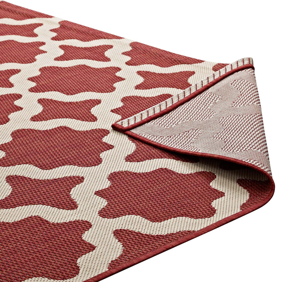 Cerelia Moroccan Trellis Indoor and Outdoor Area Rug in Red and Beige.