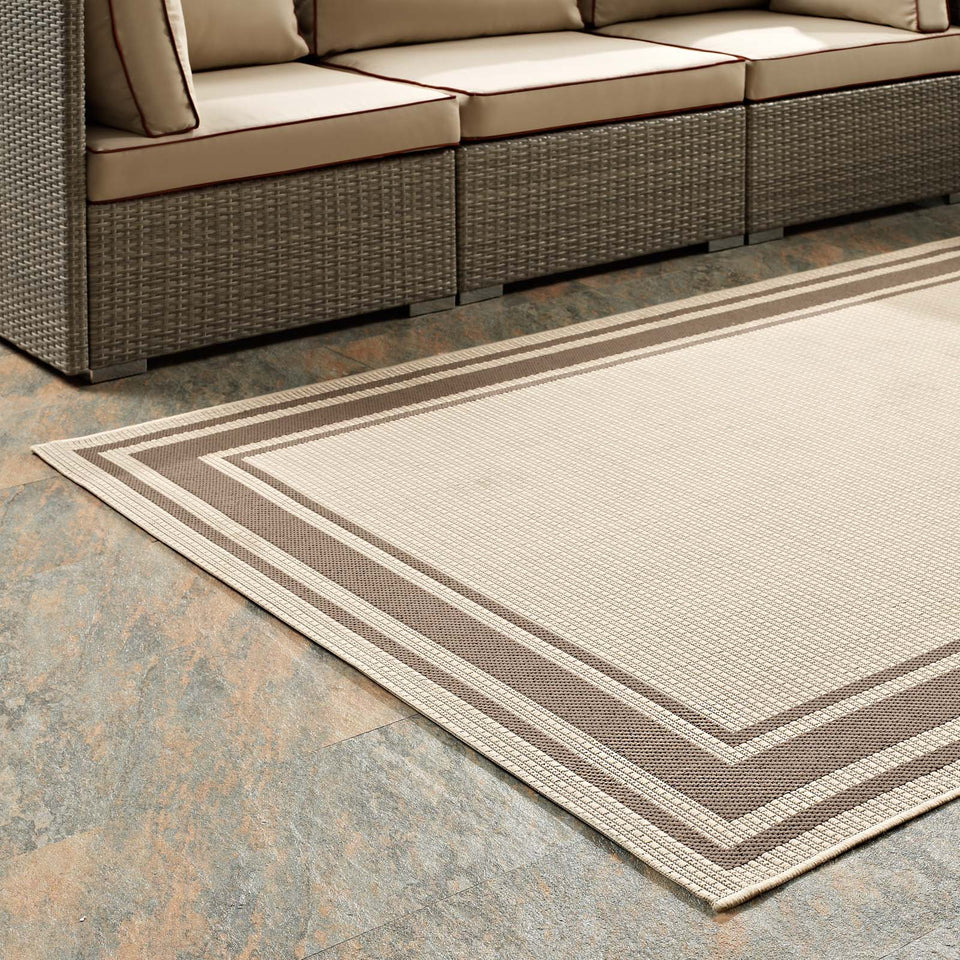 Rim Solid Border Indoor and Outdoor Area Rug in Light and Dark Beige.