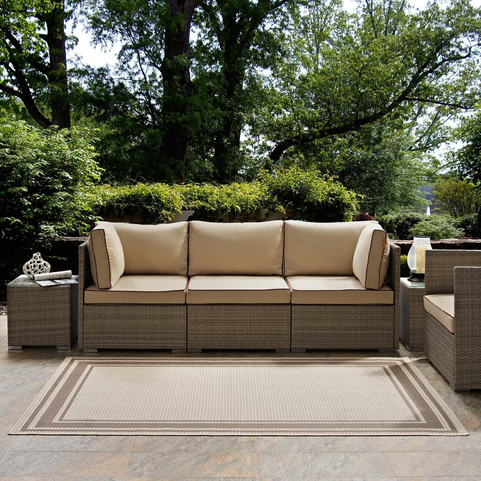 Rim Solid Border Indoor and Outdoor Area Rug in Light and Dark Beige.