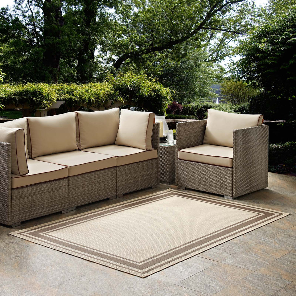 Rim Solid Border Indoor and Outdoor Area Rug in Light and Dark Beige.