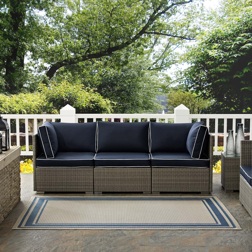 Rim Solid Border Indoor and Outdoor Area Rug in Blue and Beige.