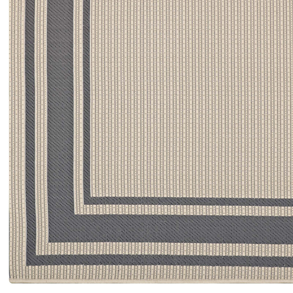 Rim Solid Border Indoor and Outdoor Area Rug in Gray and Beige.