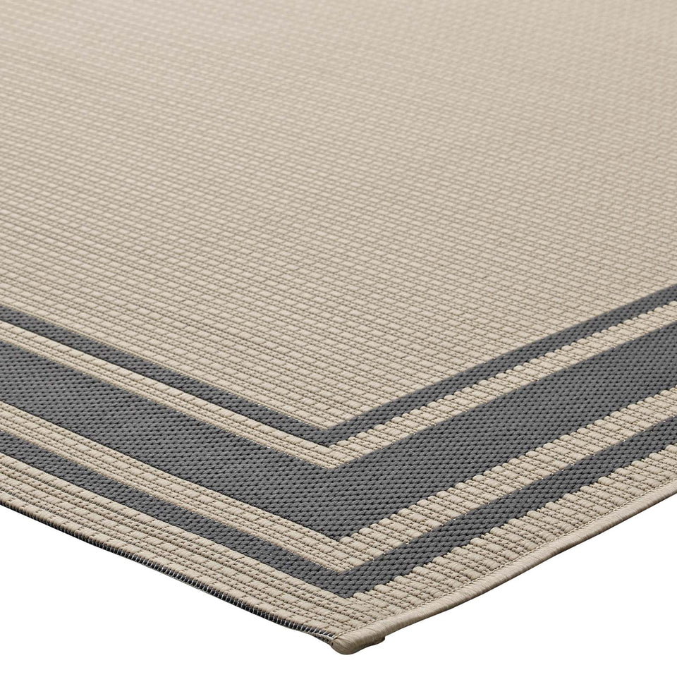 Rim Solid Border Indoor and Outdoor Area Rug in Gray and Beige.