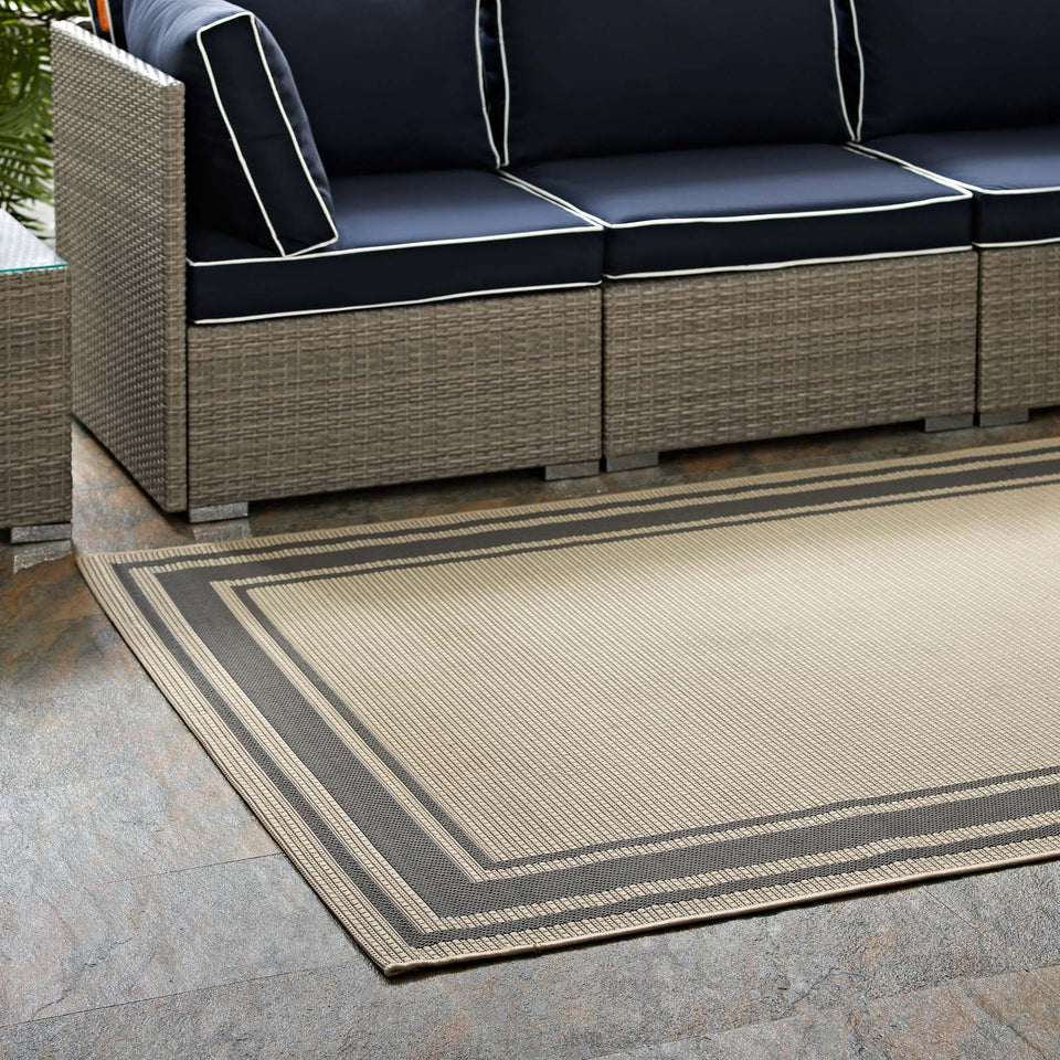 Rim Solid Border Indoor and Outdoor Area Rug in Gray and Beige.