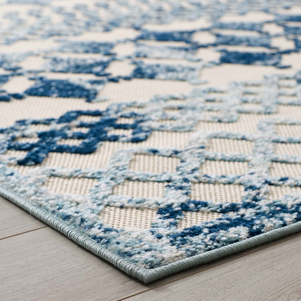 Reflect Giada Abstract Diamond Moroccan Trellis Indoor/Outdoor Area Rug in Ivory and Blue.
