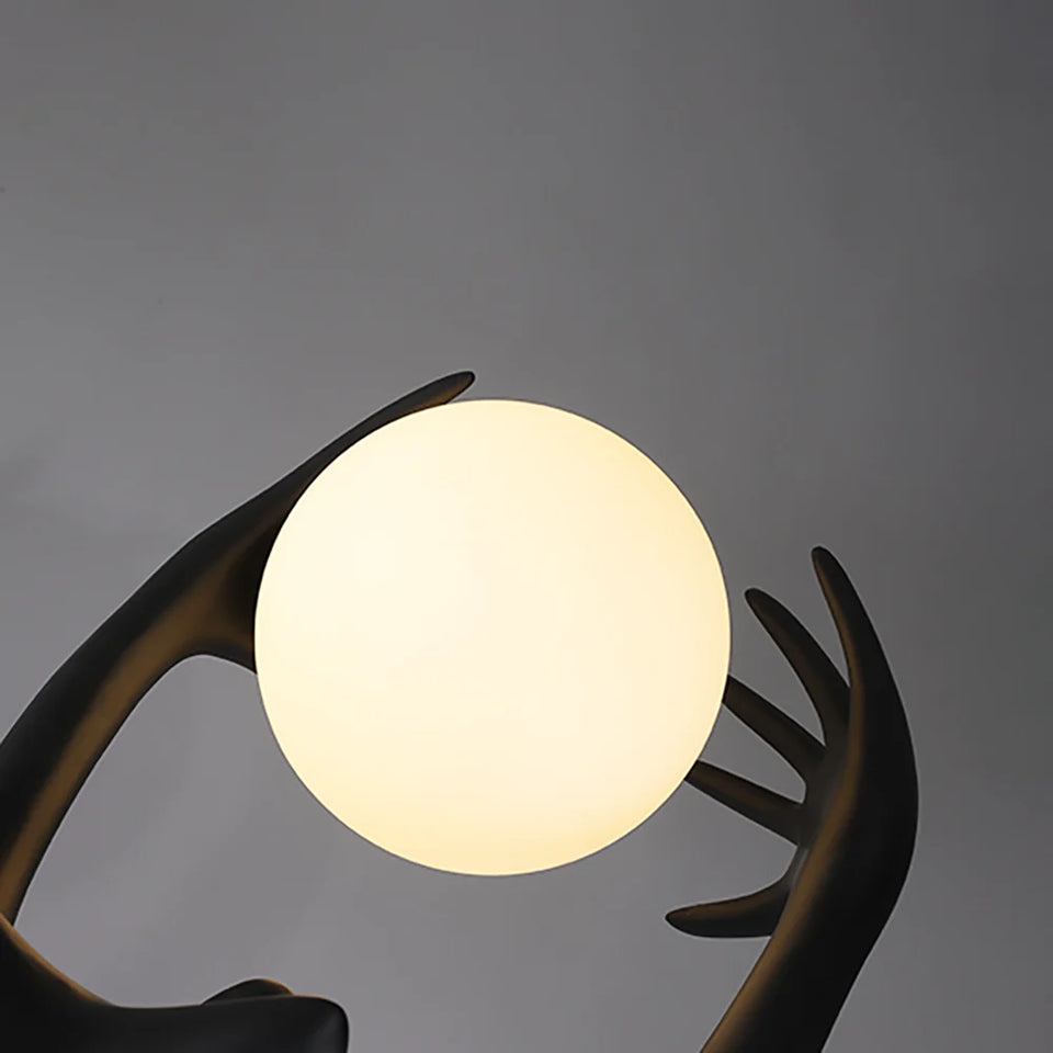 Ball Holding Sculpture Character Floor Lamp
