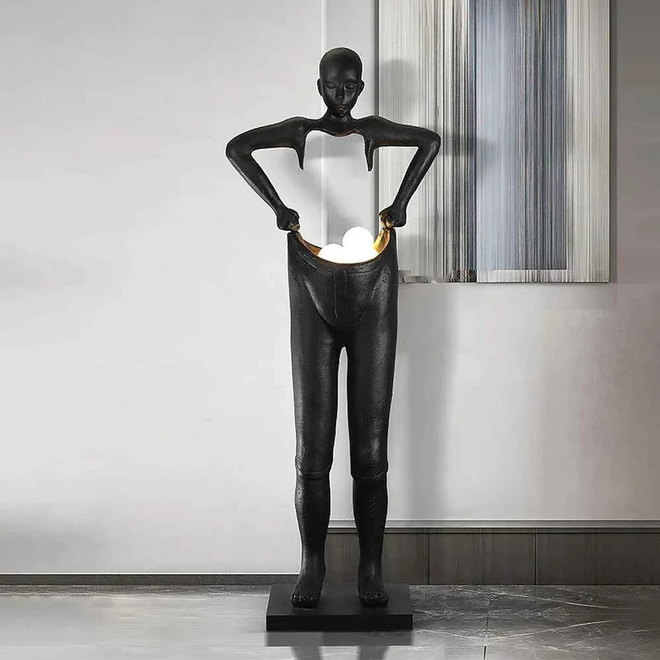 Man Carrying Pants Statue Floor Lamp