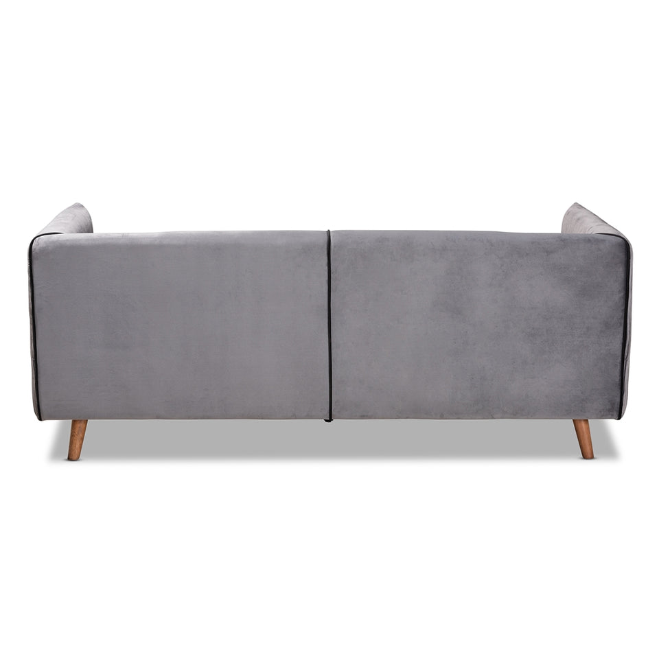 Beacher modern and contemporary grey velvet fabric upholstered and walnut brown finished wood sofa.