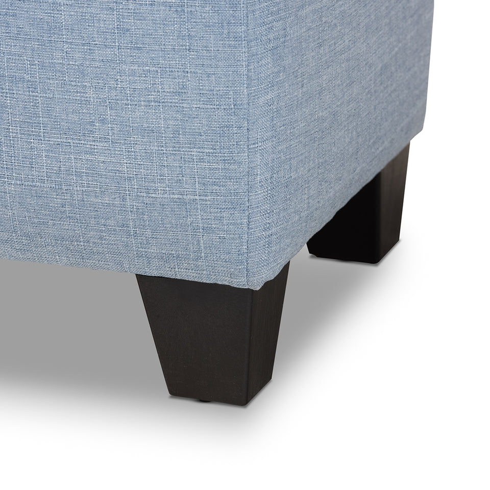 Fera modern and contemporary light blue fabric upholstered storage ottoman.