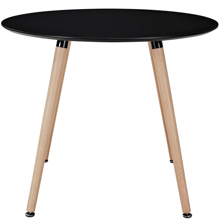 TRACK ROUND DINING TABLE IN BLACK.