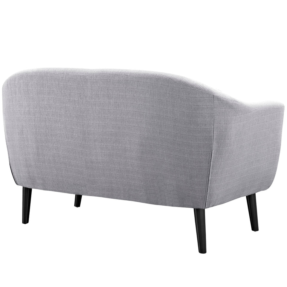 Wit Upholstered Fabric Loveseat.